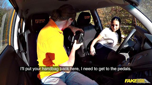 Tattooed brunette fucks for license