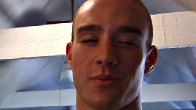 A shaved head and a naughty but nice looks belong to Kenny. Already shirtless, he pulls his pants and boxers down around his ankles and gets to work on his thick cock.