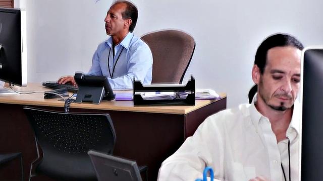 Bareback office threesome with a tattooed hunk and his glasses-wearing amateur friend