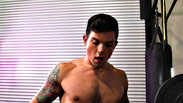 Inked gym stud barebacks hunky on bench press