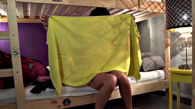 Darkhair hostel lezzie seduced into oral with babes