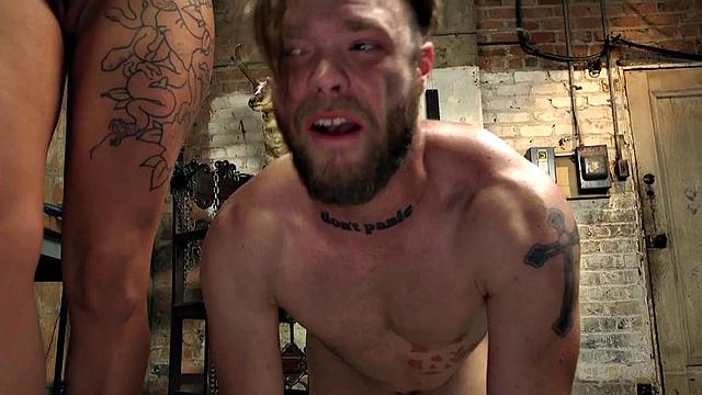 Submissive guy fucked by busty latex tattooed domina