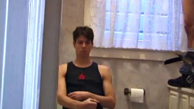 Dan Doe and Jayden have a little bet. Dan claims he can stand on the bathroom counter and shoot his load over onto the shower doors, 5 feet away. $10 is on the table and then $20. Jayden sits on the toilet and plays with himself.