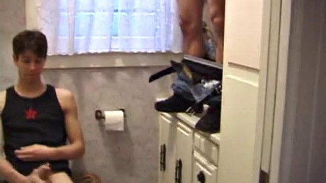 Dan Doe and Jayden have a little bet. Dan claims he can stand on the bathroom counter and shoot his load over onto the shower doors, 5 feet away. $10 is on the table and then $20. Jayden sits on the toilet and plays with himself.