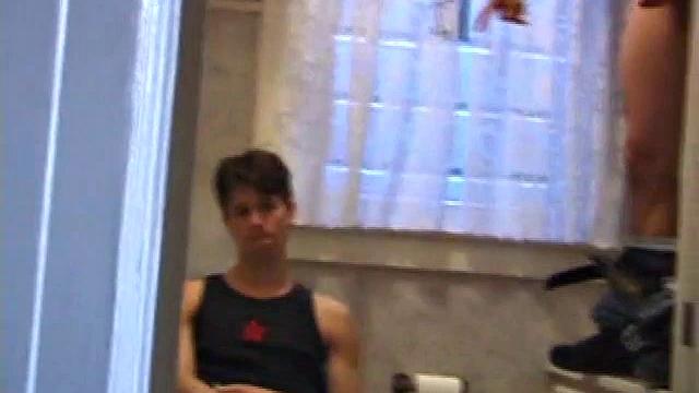 Dan Doe and Jayden have a little bet. Dan claims he can stand on the bathroom counter and shoot his load over onto the shower doors, 5 feet away. $10 is on the table and then $20. Jayden sits on the toilet and plays with himself.