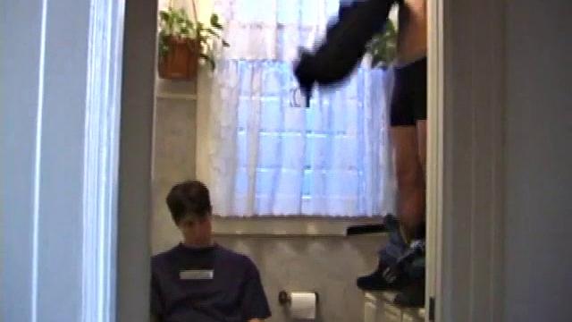 Dan Doe and Jayden have a little bet. Dan claims he can stand on the bathroom counter and shoot his load over onto the shower doors, 5 feet away. $10 is on the table and then $20. Jayden sits on the toilet and plays with himself.