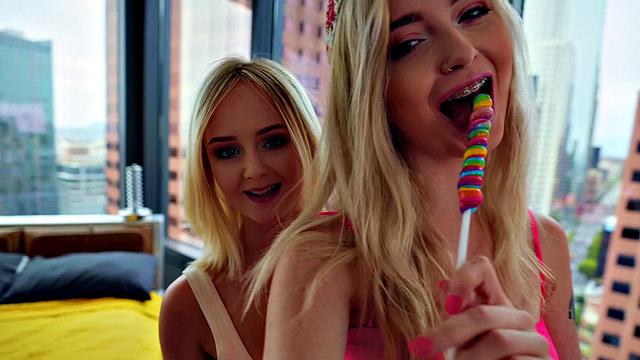 Blonde babe Summer Scissor gets her small tits pierced and licks her bald pussy in hot lesbian action