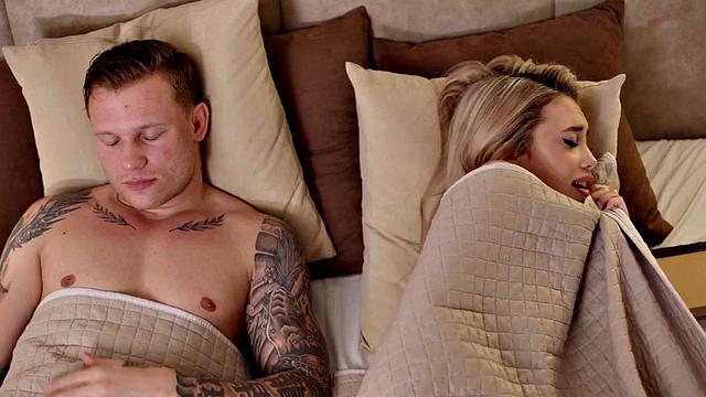 Passionate couple making love after eating in bed