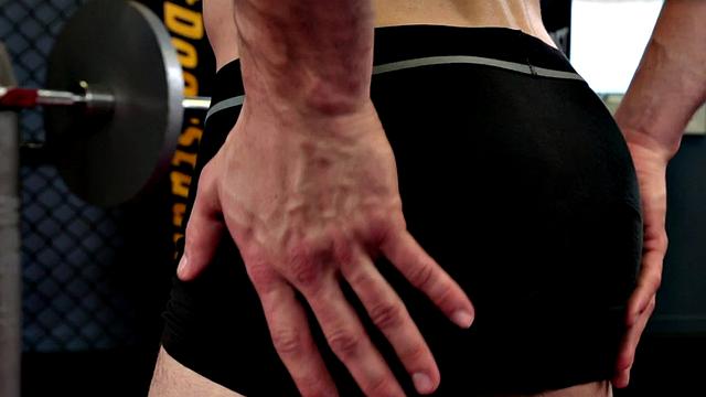 Amateur hunk strips and masturbates in the gym