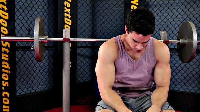 Amateur hunk strips and masturbates in the gym