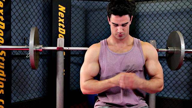 Amateur hunk strips and masturbates in the gym