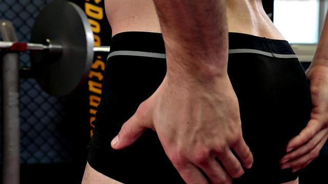 Amateur hunk strips and masturbates in the gym