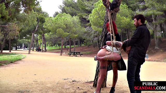 Cute bonded babe dominated outside