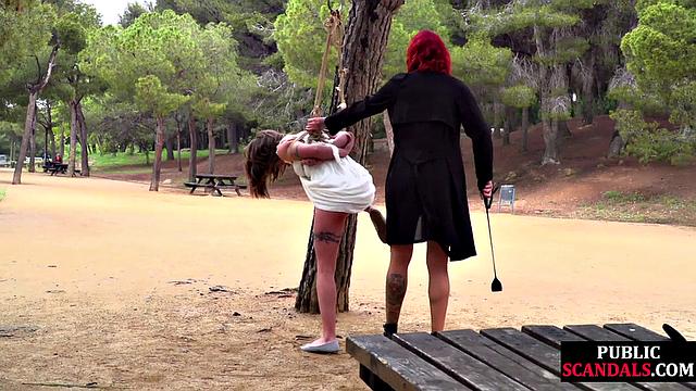 Cute bonded babe dominated outside