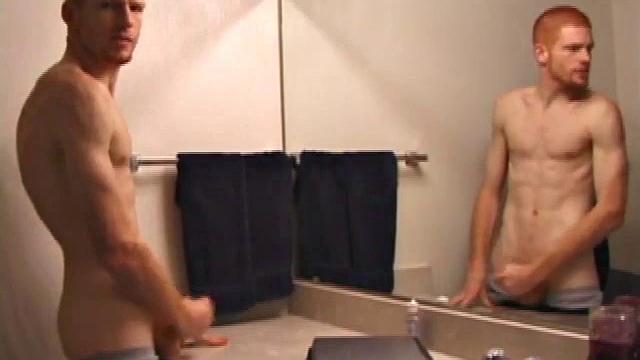 In this solo scene, young Tristian beats off in the bathroom to porn on a laptop, releasing all over mirror and counter top.