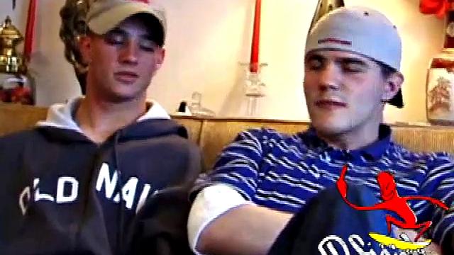 Lukas, Kenny and Timmy are hanging out and decide to explore each other in a threesome. Kenny slides to his knees to blow Lukas, while Timmy watches and rubs his cock head.