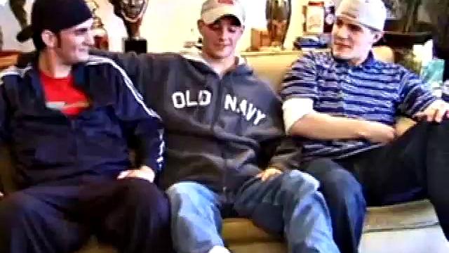 Lukas, Kenny and Timmy are hanging out and decide to explore each other in a threesome. Kenny slides to his knees to blow Lukas, while Timmy watches and rubs his cock head.