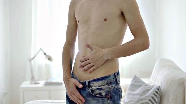 Slim stud jerking thick cock after teasing his body