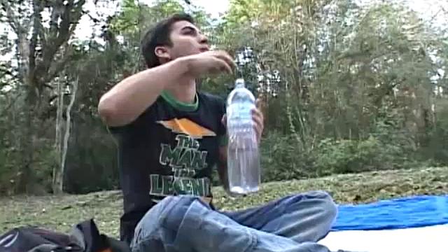 James and Caiki are a couple of cute Latin twinks out for a nature hike and picnic. Caiki leaves to take a piss, and after a while James starts looking for him. He discovers his Latin buddy naked and shoving a dildo up his ass.