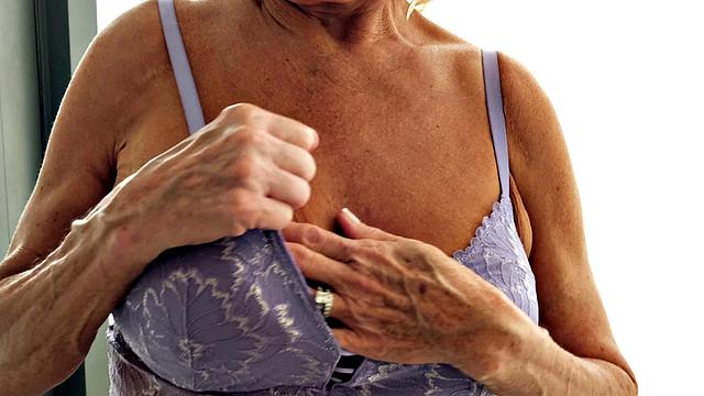 Our oldest GILF returns to show off her tits and finger her old snatch