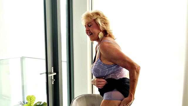 Our oldest GILF returns to show off her tits and finger her old snatch