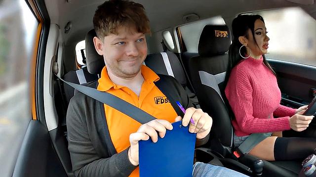Big-titted driving student riding on cock for her first class