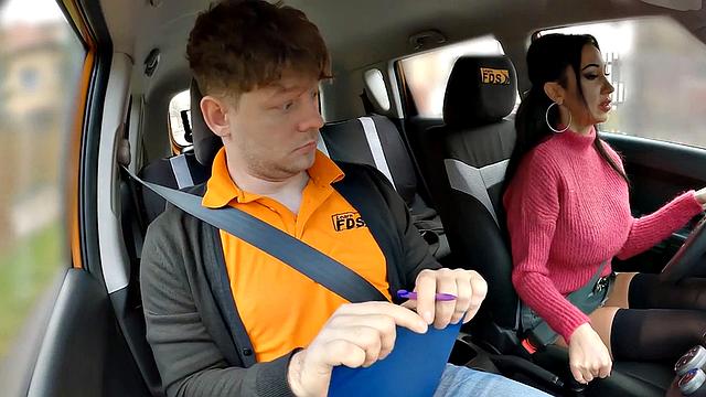 Big-titted driving student riding on cock for her first class
