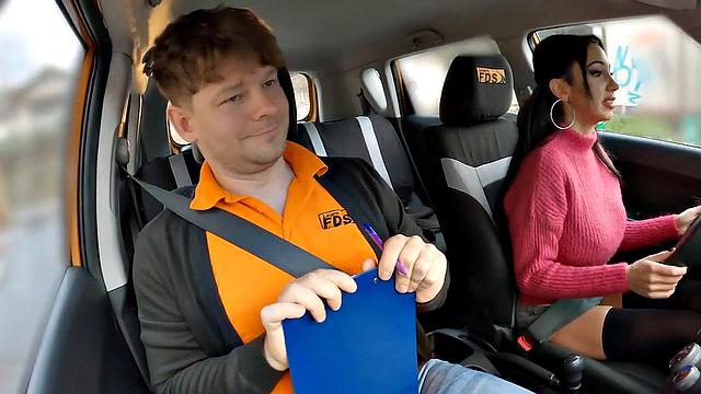 Big-titted driving student riding on cock for her first class