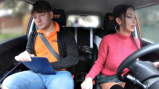 Big-titted driving student riding on cock for her first class