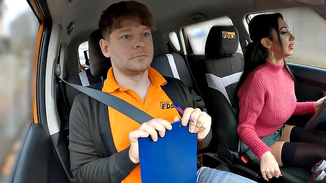 Big-titted driving student riding on cock for her first class