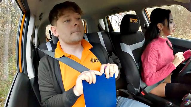 Big-titted driving student riding on cock for her first class