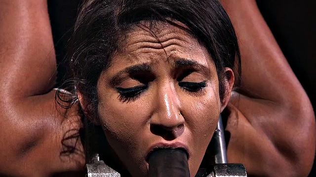 Asian BDSM sub gets pussy stuffed with dildo stick