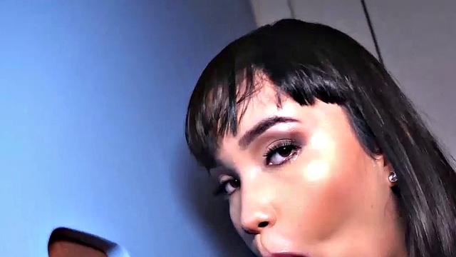 Big TS babe sucks gloryhole cock in closeup BJ