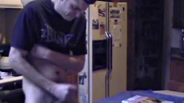 Ric brings a porn magazine, lube, and a towel to rip one off. After pulling out his hard dick and flipping through girlie magazines, Ric lets a helping hand tpuch him.