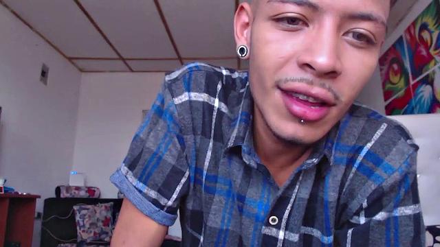 This super skinny Latin boy teases us a bit, before kicking back and stripping out of his clothes. All boned up and ready for action, the young man delivers a hot stroke show that ends with his cum spattered to his chest