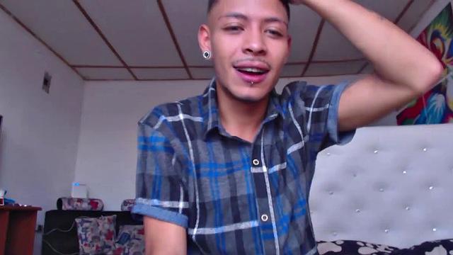 This super skinny Latin boy teases us a bit, before kicking back and stripping out of his clothes. All boned up and ready for action, the young man delivers a hot stroke show that ends with his cum spattered to his chest