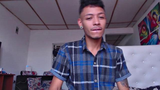 This super skinny Latin boy teases us a bit, before kicking back and stripping out of his clothes. All boned up and ready for action, the young man delivers a hot stroke show that ends with his cum spattered to his chest