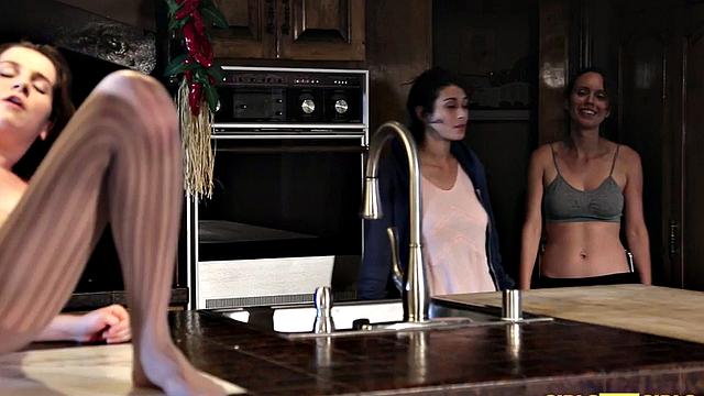 Erotic lesbian rubbing clit in stockings while babes watch