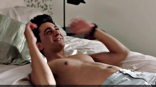 Elizabeth Hurley shows off her hot bod in a wet, sunny bikini