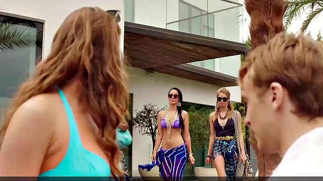 Elizabeth Hurley shows off her hot bod in a wet, sunny bikini