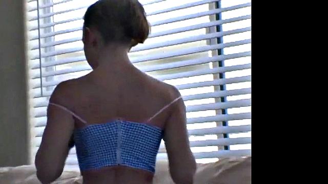 Blonde Amber showing tits and ass Photoshoot