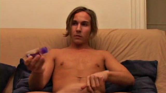 We look in on long-haired LaBelli already starting on his hard on. He settles back into the couch and goes right to work bringing that bulge to perfect hardness, while savoring every stroke.