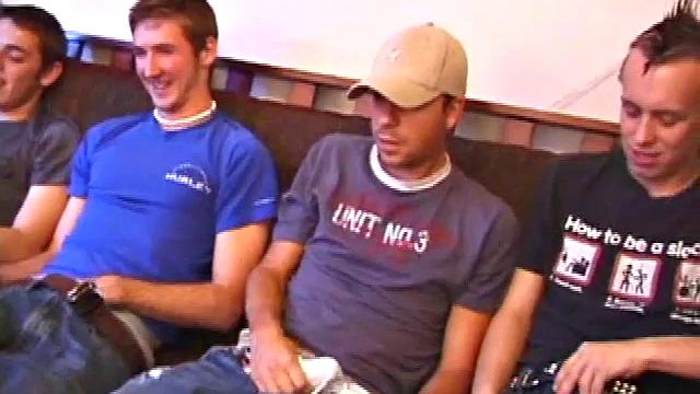 The boys have gathered to give Roar a little surprise. Each boy starts stroking solo to the moans on the porn video. They take their clothes off at different times and, before you know it, there are four naked boys with throbbing cocks.