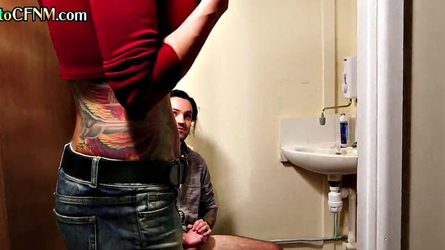 Toilet CFNM amateur domina with tattoos wanks cock