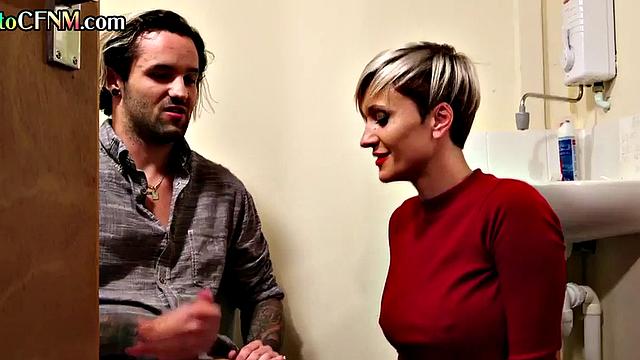 Toilet CFNM amateur domina with tattoos wanks cock