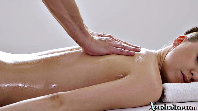 Busty cute babe rides her masseur