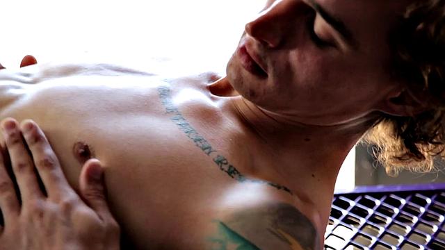 Sixpack jock solo masturbates on sunbed outdoors