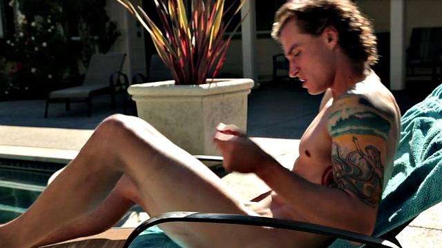 Sixpack jock solo masturbates on sunbed outdoors