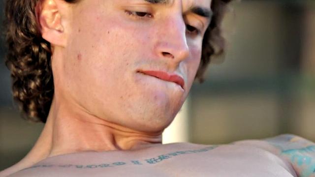 Sixpack jock solo masturbates on sunbed outdoors