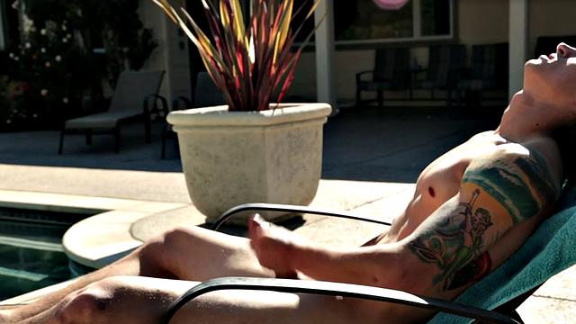 Sixpack jock solo masturbates on sunbed outdoors
